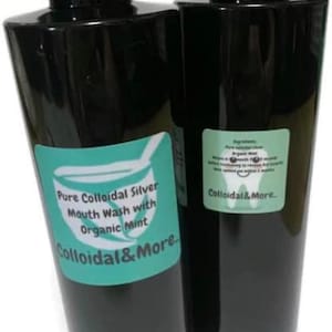 May include: Two black bottles of pure colloidal silver mouthwash with organic mint. The bottles have green and white labels with the text "Pure Colloidal Silver Mouth Wash with Organic Mint" and "Colloidal & More."