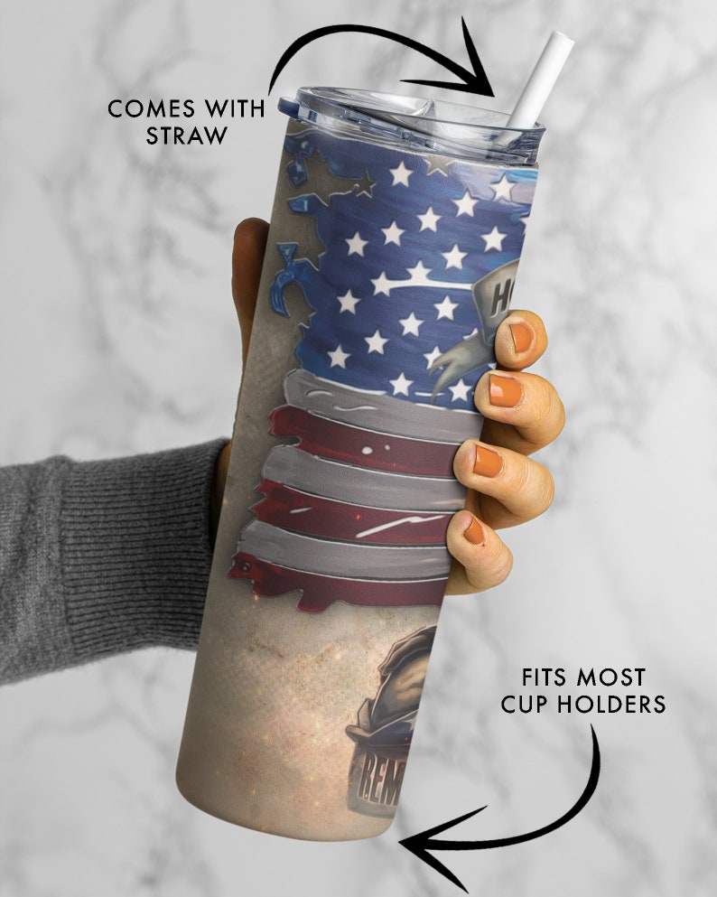 May include: A stainless steel tumbler with a distressed American flag design and the words "REMEMBER" and "HERO" on it. The tumbler comes with a straw and fits most cup holders.