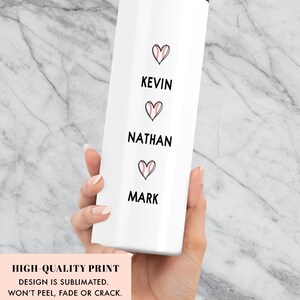 May include: White tumbler with black text and baseball-themed hearts. The text reads "Kevin", "Nathan", and "Mark".