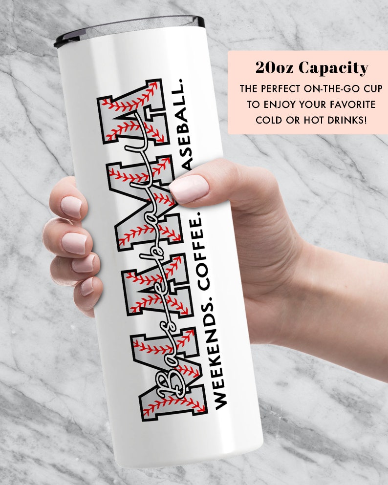 May include: White stainless steel tumbler with a baseball-themed design. The tumbler features the word "MAMA" with a baseball stitch pattern and the text "Weekends. Coffee. Baseball." The tumbler has a 20oz capacity.
