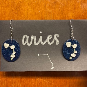 Floral Zodiac star constellations - handcrafted polymer clay - oval shaped dangle drop earrings with floral glow in the dark arrangement