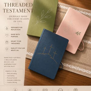 Op de afbeelding: Drie tijdschriften in groen, roze en blauw met geborduurde ontwerpen. De tekst "THREADED TESTAMENT" en "JOURNALS MADE FOR EVERY SEASON OF LIFE" zijn zichtbaar. De tijdschriften zijn ontworpen voor reflectie en gemaakt met een doel.
