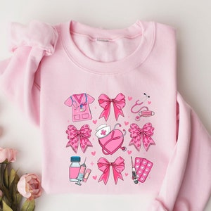Pink Valentine Nurse Coquette  Shirt, Valentine Nurse Sweatshirt, Cupids Favorite Nurse, Nurse Valentines Shirt Design, Valentines Day Gift