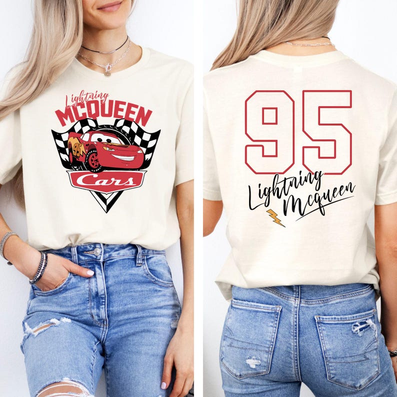 May include: White t-shirt with a red cartoon race car and the text "Lightning McQueen Cars" on the front. The back of the shirt has the number "95" and the text "Lightning McQueen" in black.