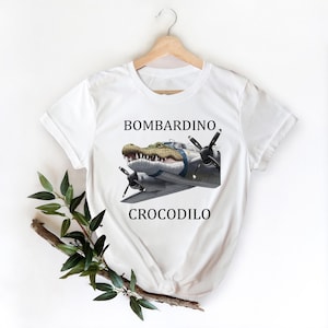 Bombardino Crocodilo Crocodile Plane Graphic T-Shirt, Funny Aviation Shirt with Alligator Design, Unique Pilot T-shirt for Men and Women Tee