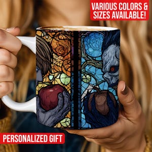 May include: White ceramic mug featuring a stained-glass style design with a red apple and a skull. The mug has the text "PERSONALIZED GIFT" and "VARIOUS COLORS & SIZES AVAILABLE!"