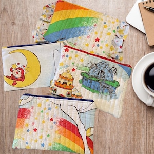 Cartera acolchada con cremallera Rainbow Brite y neceser