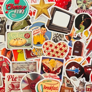 May include: A collection of assorted vintage-style stickers featuring diverse graphics including a Cherry Bomb logo, a retro television, a cookie advertisement, a heart with red stars, a red varsity jacket, a cat, and various food and drink illustrations.