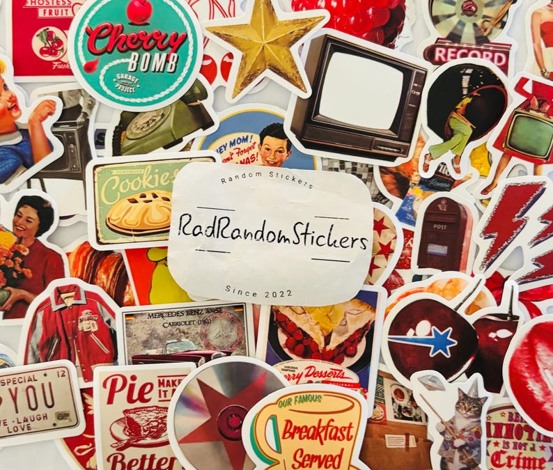 May include: A collection of assorted stickers featuring retro-style illustrations including a cherry bomb logo, a vintage television, a red lightning bolt, a cat, various food items, and a central white label with the text RadRandomStickers Since 2022.
