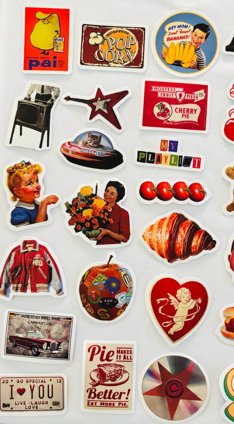 May include: A collection of assorted die-cut stickers featuring vintage-style illustrations, including a yellow potato character, popcorn, a child with bananas, a television, a star-shaped guitar, cherry pie, a cat in a spaceship, and various food items.