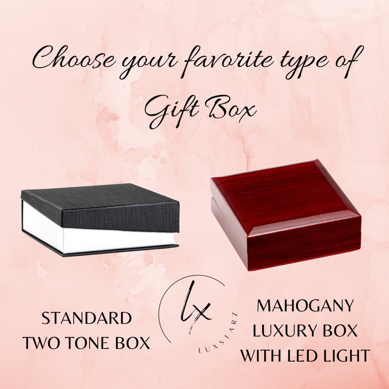 May include: Two gift box options for jewelry. A standard two-tone box with a black top and white bottom. A mahogany luxury box with an LED light.
