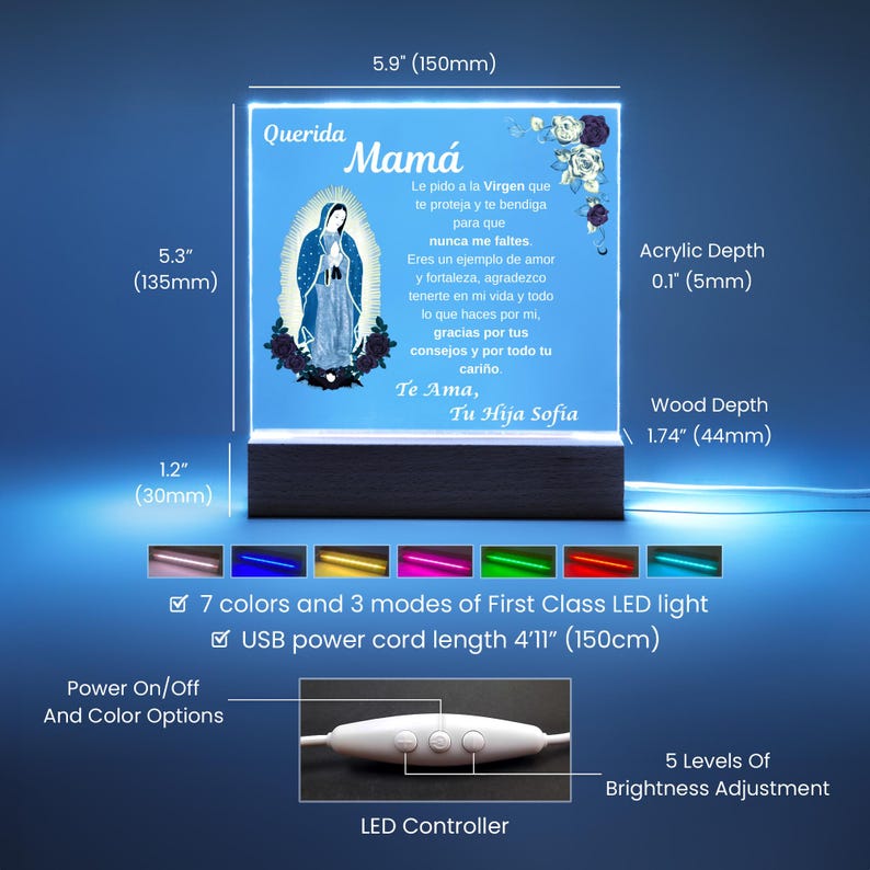 May include: A lighted acrylic plaque with a blue background and a wooden base. The plaque features an image of the Virgin Mary and Spanish text that reads "Querida Mam&aacute;". The plaque is 5.9 inches (150mm) wide and 5.3 inches (135mm) tall.