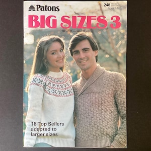 May include: A vintage knitting pattern book cover featuring a woman and a man wearing knitted sweaters. The cover has the text "Patons BIG SIZES 3" with measurements of 40-50 inches. The cover also states "18 Top Sellers adapted to larger sizes."