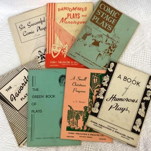 May include: A collection of seven vintage softcover playbooks featuring titles such as Six Successful Comic Plays, Pantomimes Plays and Monologues, Comic Stage Plays, The Favorite Plays, The Green Book of Plays, A Small Christmas Program, and A Book of Humorous Plays.