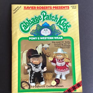 May include: A vintage Cabbage Patch Kids pattern book with the title "Pony & Western Wear." The cover features illustrations of Cabbage Patch Kids dolls in cowboy and cowgirl outfits, along with a horse. The book is yellow with green and red accents.