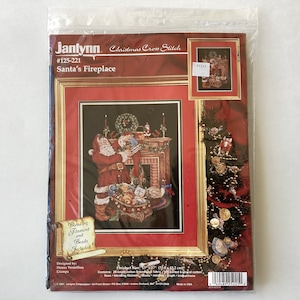 May include: A cross stitch pattern featuring Santa Claus filling a stocking by a fireplace. The pattern includes blending filament and beads. The finished size is 13 x 17 inches (33.0 x 43.2 cm). The pattern is by Janlynn and is called "Santa's Fireplace".