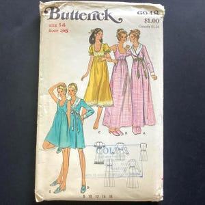 May include: Vintage Butterick sewing pattern envelope. The envelope shows illustrations of women in dresses and robes. The text on the envelope includes "SIZE 14", "BUST 36", and the pattern number "6049". The price is listed as £0.80.