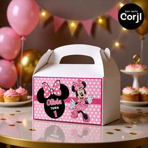 May include: White party favor box with a pink polka dot design and Minnie Mouse graphics. The box features a large Minnie Mouse head with the name "Olivia" and the number "1". Pink balloons and cupcakes are in the background.