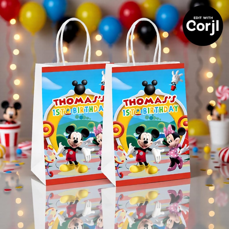 May include: Two white party favor bags with a colorful Mickey Mouse design. The bags feature Mickey and Minnie Mouse, the text "THOMAS' 1ST BIRTHDAY", and a blue sky background. White handles are at the top.