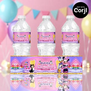 May include: Three clear water bottles with labels that read "OLIVIA'S Bow-tique". The labels are pink and yellow with cartoon graphics. The bottles sit on a decorative table runner with cartoon characters and the text "OLIVIA'S Bow-tique".