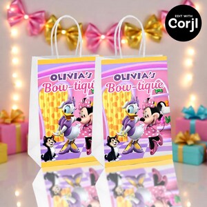 May include: Two white gift bags with handles, featuring a colorful design with Daisy Duck, Minnie Mouse, and a black cat. The bags have the text "OLIVIA'S Bow-tique" and are decorated with pink and yellow accents.