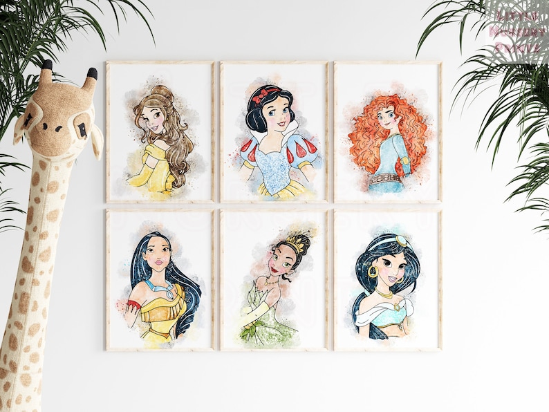 May include: Set of six watercolor-style prints featuring Disney princesses. Each print features a different princess, including Belle, Snow White, Merida, Pocahontas, Tiana, and Jasmine. The prints are framed in a simple white frame.