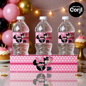 May include: Three clear plastic water bottles with pink Minnie Mouse labels. The labels feature a polka dot background, Minnie Mouse, and the text "Olivia 1". A matching pink polka dot banner is in front of the bottles.