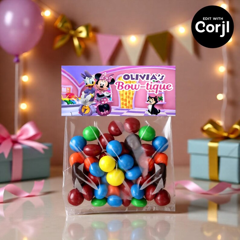 May include: A clear cellophane bag filled with colorful candies, featuring a decorative label with the text "OLIVIA'S Bow-tique" and cartoon characters. The background includes party decorations like balloons and gift boxes.