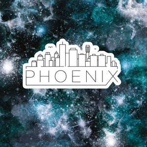 May include: A black and white line art illustration of the Phoenix skyline with the word "PHOENIX" in a white rectangle below the skyline. The image is set against a dark blue background with white stars.