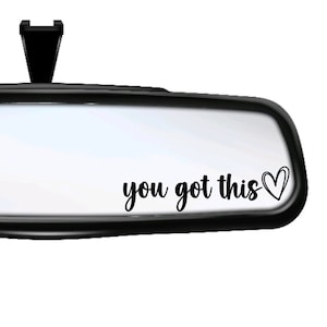 May include: Black and white car mirror decal with the text "you got this" and a small heart.
