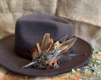 Pheasant feather hat pins and brooches