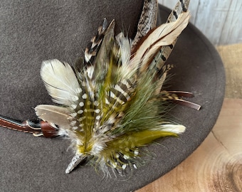 Beautiful bespoke feather brooches and hat pins handmade in the Scottish Borders