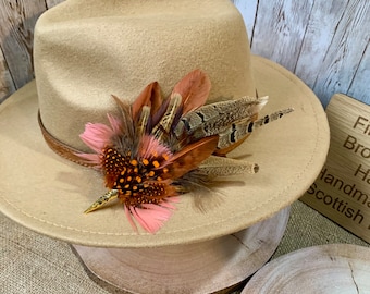 Beautiful bespoke feather brooches and hat pins handmade in the Scottish Borders