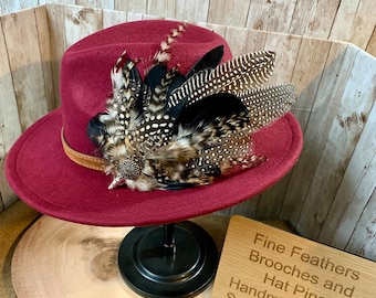 Beautiful bespoke feather brooches and hat pins handmade in the Scottish Borders