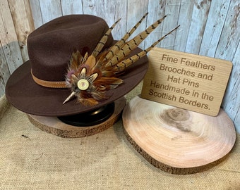 Beautiful bespoke feather brooches and hat pins handmade in the Scottish Borders