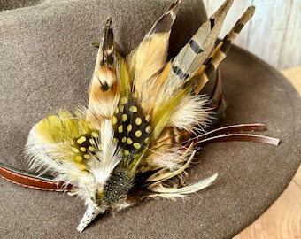 Beautiful bespoke feather brooches and hat pins handmade in the Scottish Borders