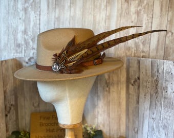 Beautiful bespoke feather brooches and hat pins handmade in the Scottish Borders
