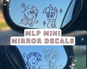 May include: Two sets of purple vinyl decals applied to a car side mirror. The top set features two pony characters with butterflies and stars. The bottom set shows two different pony characters with diamond and apple icons. Text reads MLP MINI MIRROR DECALS.