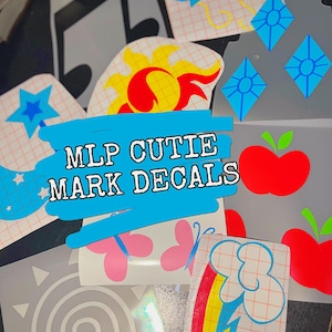 May include: A collection of MLP Cutie Mark decals. The decals feature various designs, including a sun, balloons, diamonds, apples, butterflies, a rainbow, and a star. The text "MLP CUTIE MARK DECALS" is written in a blue banner across the image.