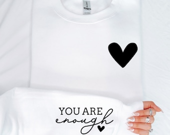 Sudadera con frases inspiradoras y palabras positivas.