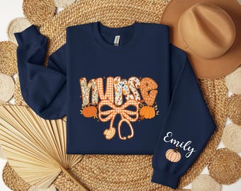 Custom Fall Nurse Sweatshirt, Personalized Nurse Pumpkin Sweatshirt For Nurse, Gift For Nurse, Fall Coquette Bow Shirt For Registered Nurse