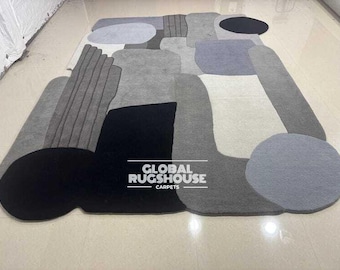 Neutraal modern abstract vloerkleed | Grijs zwart wit wollen tapijt | Handgetuft minimalistisch vloerkleed | Eigentijds interieur op maat