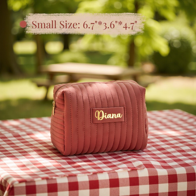 a small pink purse sitting on top of a table