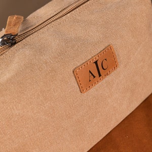 a close up of a bag with a tag on it