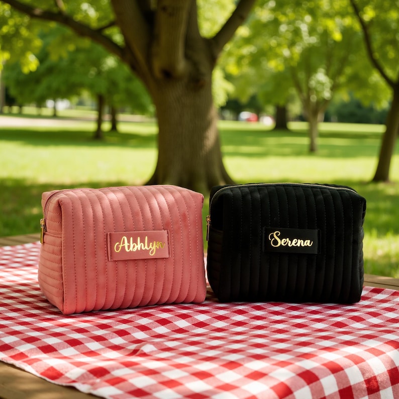a pink purse sitting on top of a white table