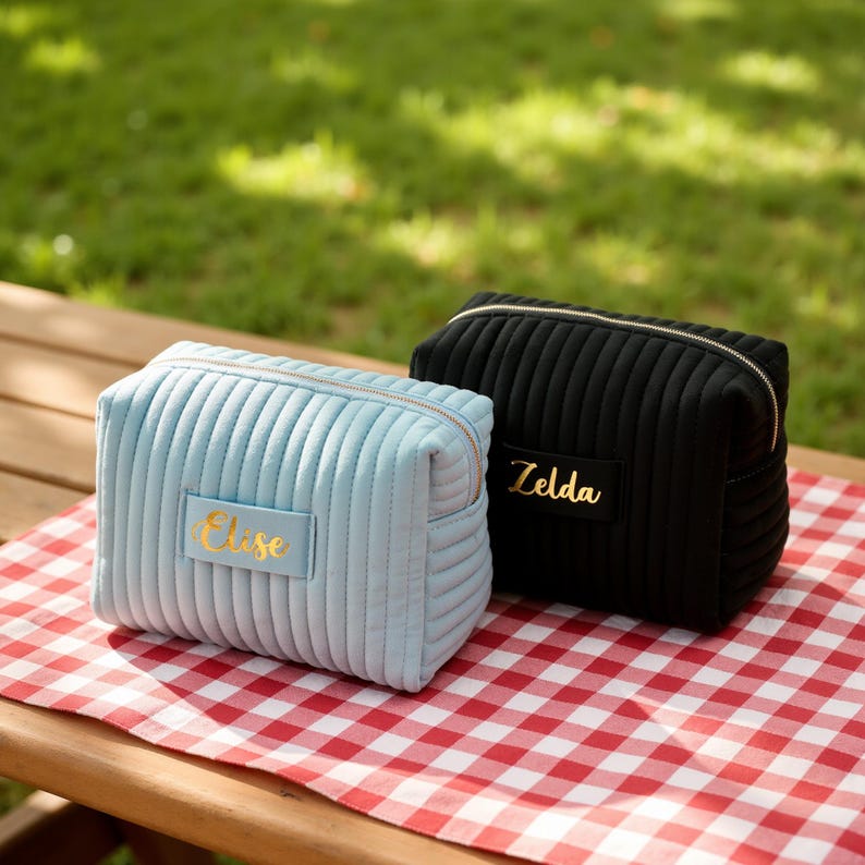 a couple of bags sitting on top of a picnic table