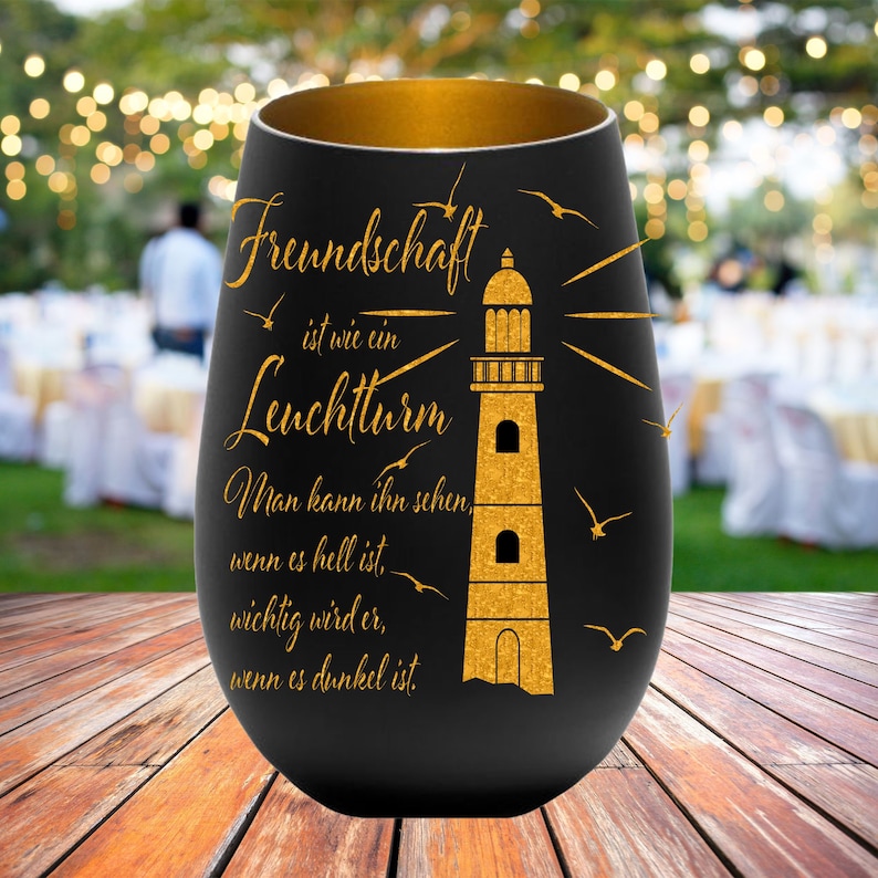 Geschenk für Freunde Freundin Freund Einweihungsgeschenk Partygeschenk mit Leuchtturm und Feundesspruch gute Freunde maritim schwarz/gold