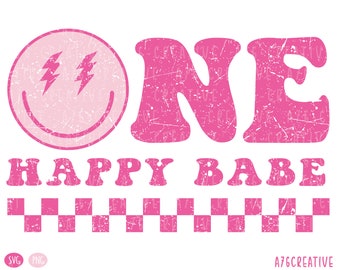 May include: Pink and white distressed graphic design with the word "ONE" in a retro font, the words "HAPPY BABE" and a pink smiley face with lightning bolts for eyes. A row of pink and white checkered squares is at the bottom of the design.