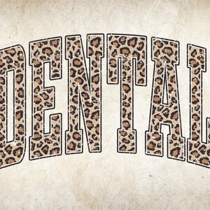 May include: The word "DENTAL" in a bold, arched design. The letters are filled with a leopard print pattern in shades of brown and tan, outlined in black. The background is a textured, off-white color.
