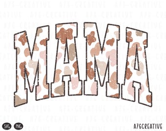 May include: The word "MAMA" in a distressed, collegiate-style font. The letters are filled with a cow print pattern in shades of brown and pink, outlined in black. The bottom right corner has the text "A76CREATIVE".